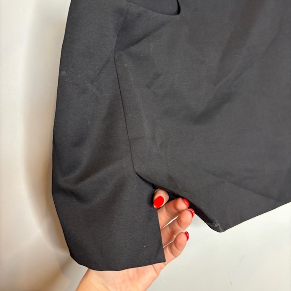 Low Classic Curved Cut-Out Mini Skirt - Picture 8 of 9